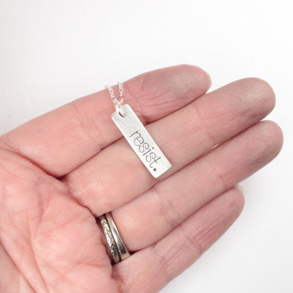 "resist." Necklace / Charm